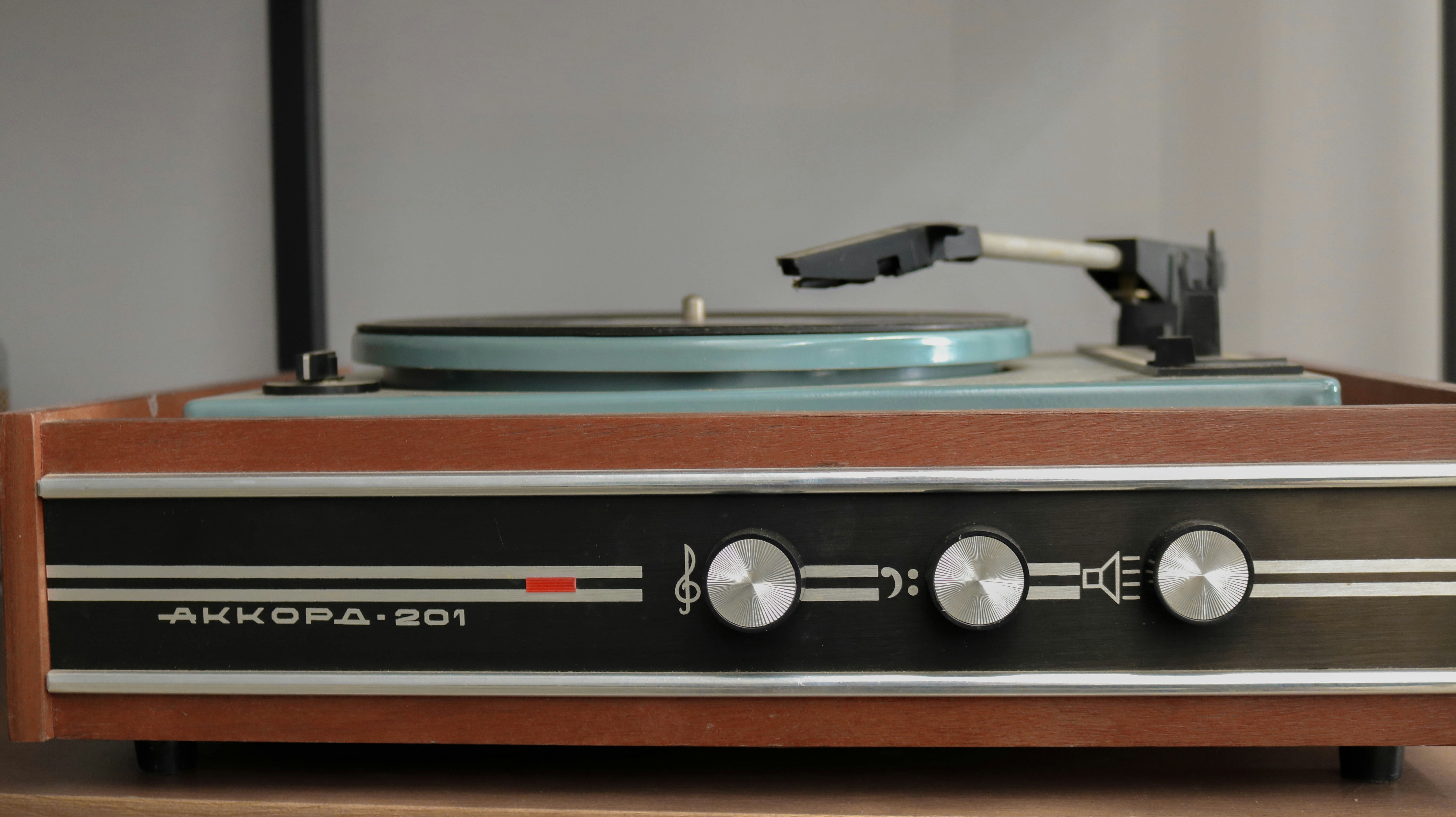 brown and gray vinyl player